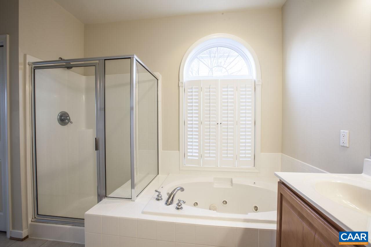 1981 Ridgetop Drive Charlottesville, VA 22903 - Photo 25 of 40 a bathroom with a bathtub and a shower