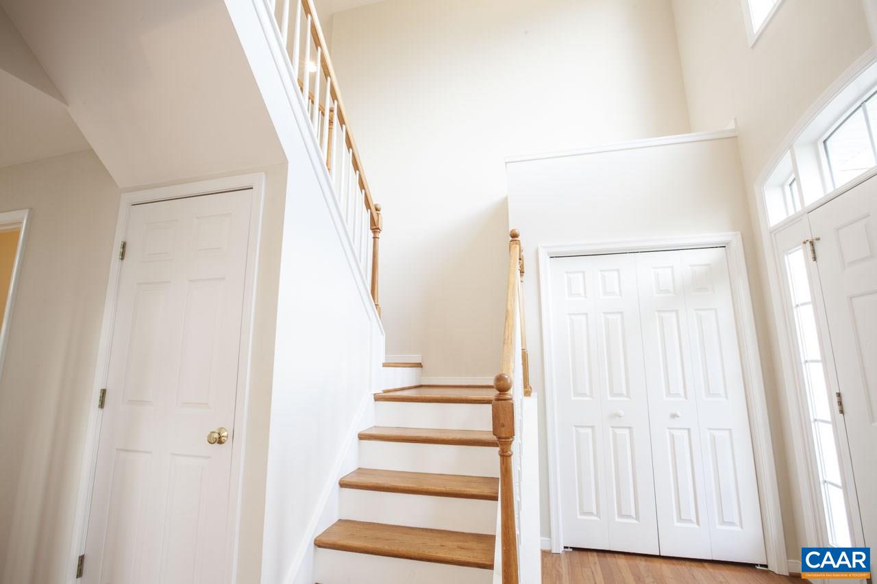 1981 Ridgetop Drive Charlottesville, VA 22903 - Photo 28 of 40 a view of staircase with wooden floor and white walls