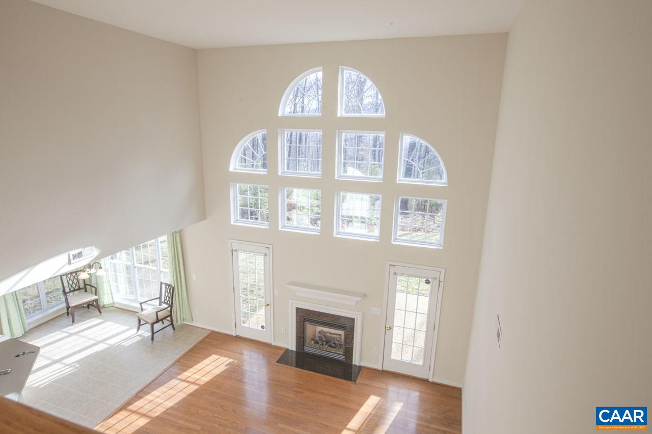 1981 Ridgetop Drive Charlottesville, VA 22903 - Photo 30 of 40 a view of a livingroom with an entryway and wooden floor
