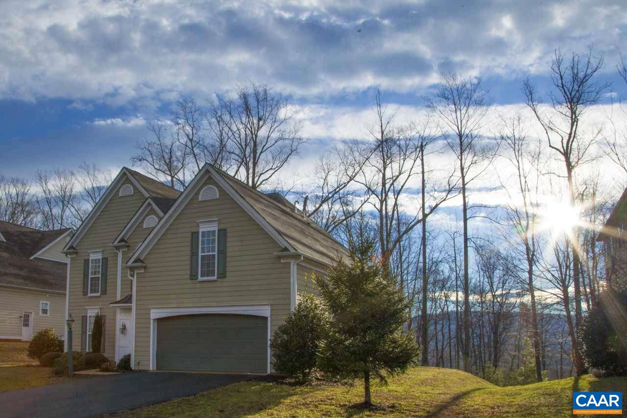 1981 Ridgetop Drive Charlottesville, VA 22903 - Photo 4 of 40 a front view of a house with a yard and tree s