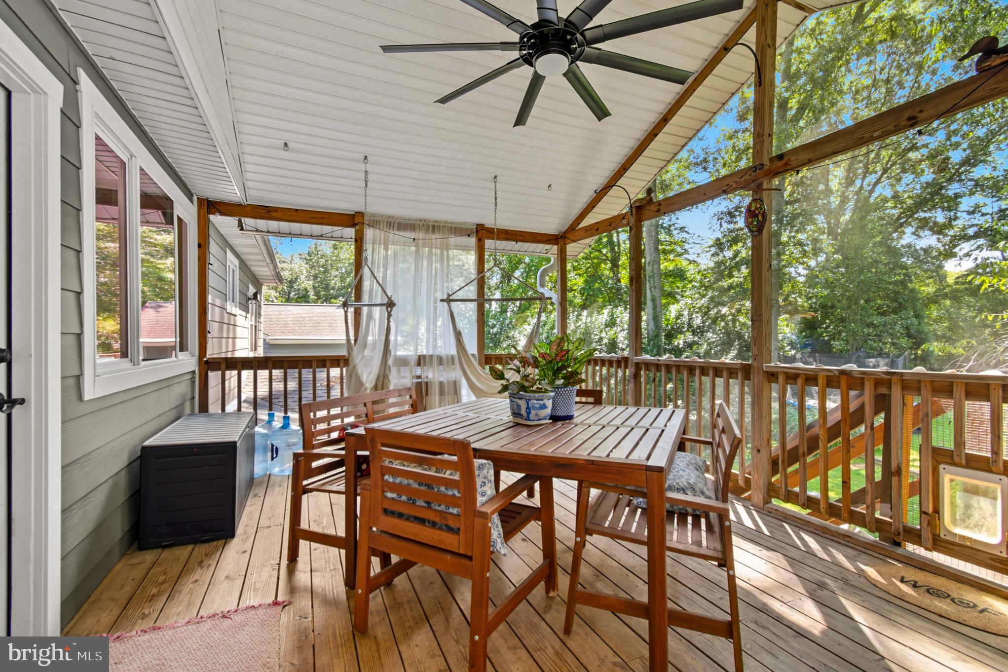 1155 Claire Road Crownsville, MD 21032 - Photo 40 of 62 Charming screened porch for outdoor relaxation.