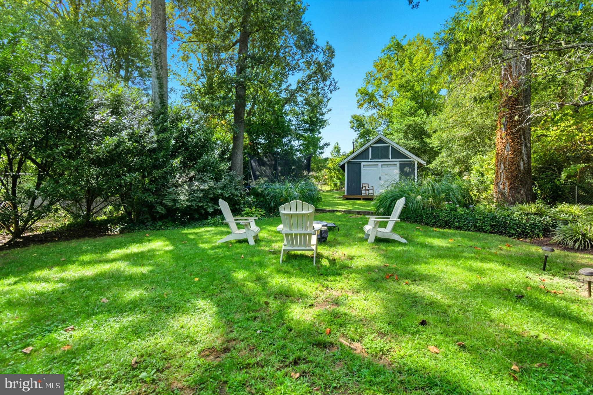 1155 Claire Road Crownsville, MD 21032 - Photo 45 of 62 Tranquil garden retreat with cozy seating.