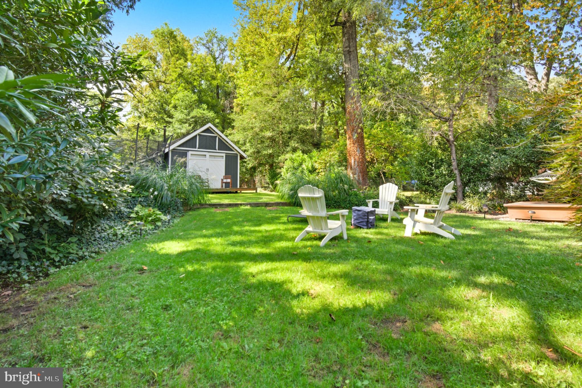 1155 Claire Road Crownsville, MD 21032 - Photo 46 of 62 Serene backyard oasis with lush greenery.