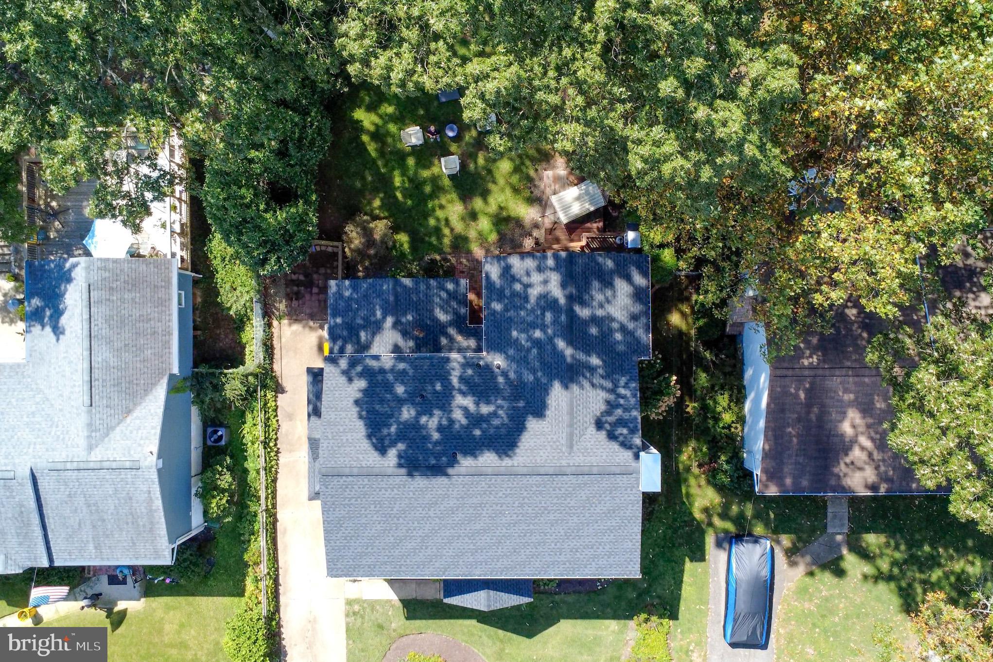 1155 Claire Road Crownsville, MD 21032 - Photo 61 of 62 Lush greenery surrounds a cozy home retreat.