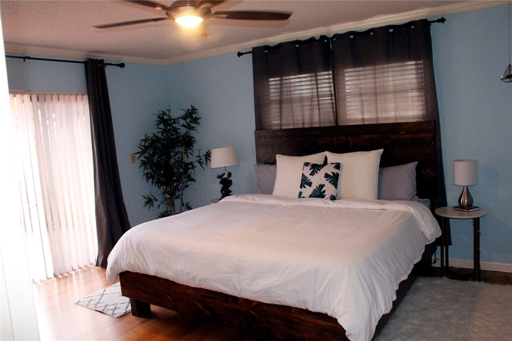 3601 East Forge Road, Unit 23 Davie, FL 33328 - Photo 11 of 17 a bedroom with a bed and a window