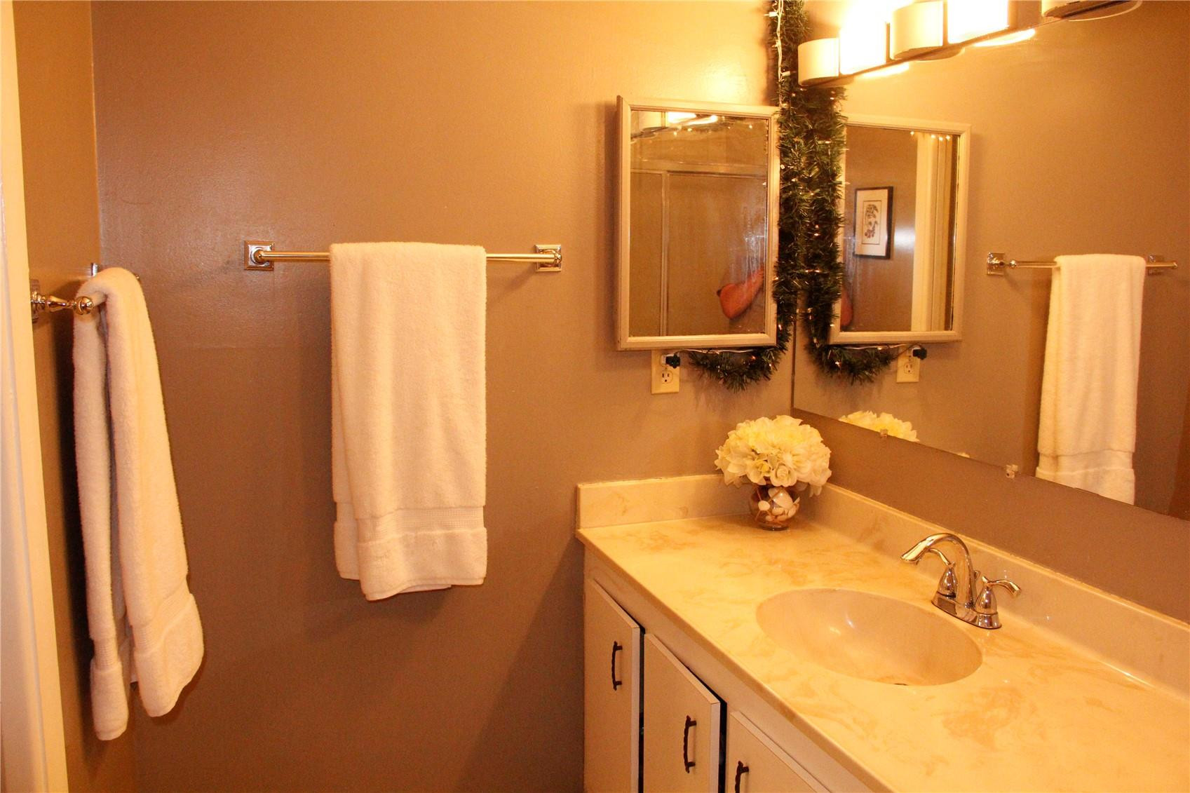 3601 East Forge Road, Unit 23 Davie, FL 33328 - Photo 13 of 17 a bathroom with a sink and a mirror