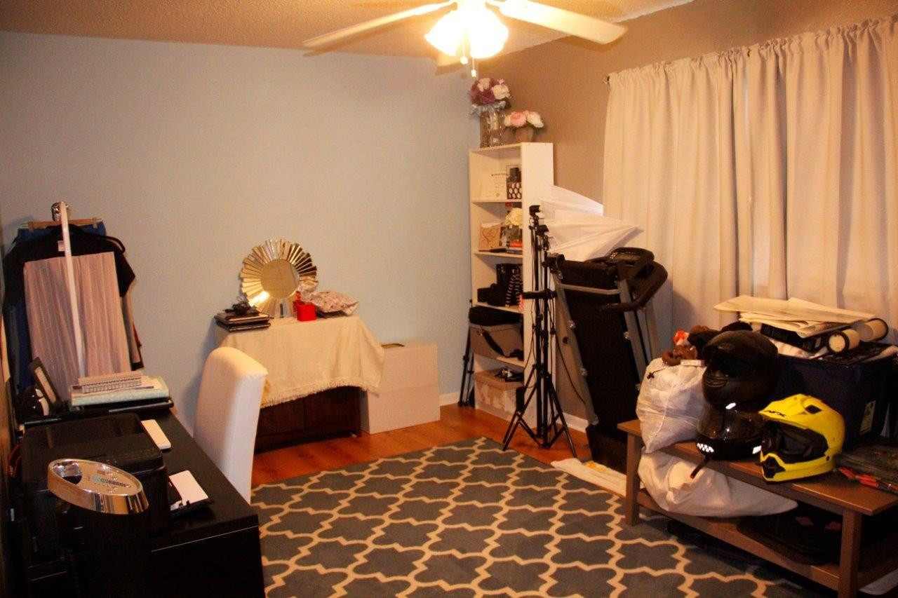 3601 East Forge Road, Unit 23 Davie, FL 33328 - Photo 16 of 17 a bedroom with furniture and a window