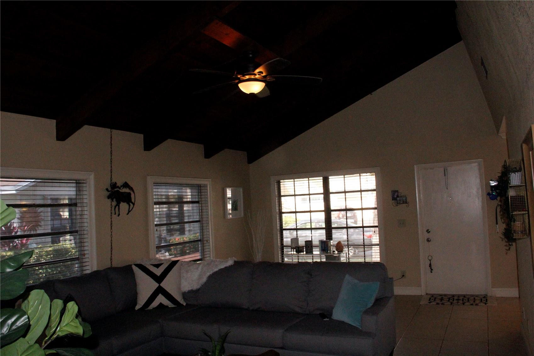 3601 East Forge Road, Unit 23 Davie, FL 33328 - Photo 3 of 17 a living room with furniture and a window