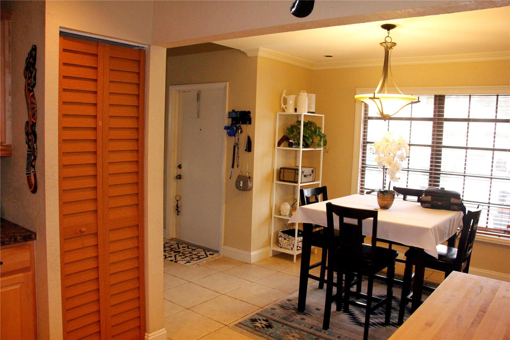 3601 East Forge Road, Unit 23 Davie, FL 33328 - Photo 5 of 17 a dining room with furniture and window