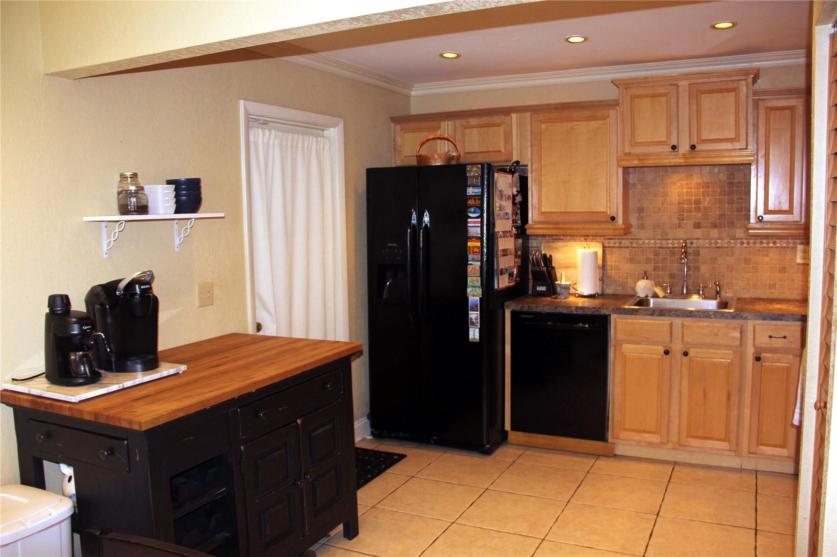 3601 East Forge Road, Unit 23 Davie, FL 33328 - Photo 7 of 17 a kitchen with stainless steel appliances granite countertop a refrigerator and a sink