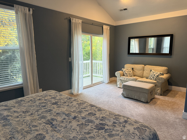 2388 East 850 South Springville, UT 84663 - Photo 24 of 58 Vaulted ceiling with recessed lighting, wall-to-wall carpeting, and a sliding glass door leading to a balcony with white railings