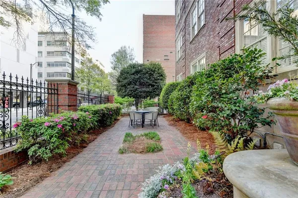 a view of a garden with a patio