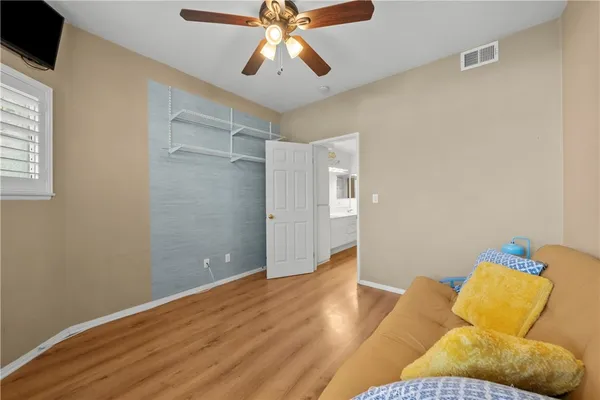 a view of livingroom with furniture and wooden floor