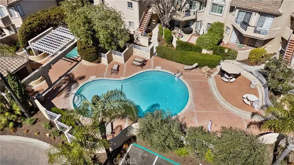 a view of a backyard of a house
