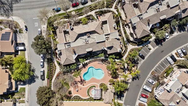 an aerial view of residential house and sandy dunes