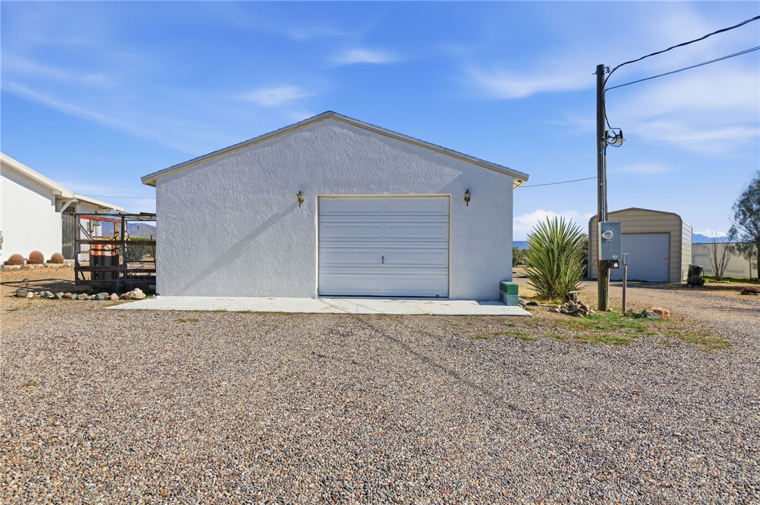 4342 Cordes Road Golden Valley, AZ 86413 - Photo 37 of 39 a house view with a backyard space