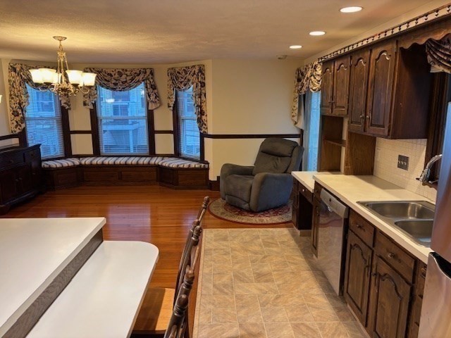 249 Lowell Street Waltham, MA 02453 - Photo 11 of 29 a spacious bathroom with a tub double vanity and a shower