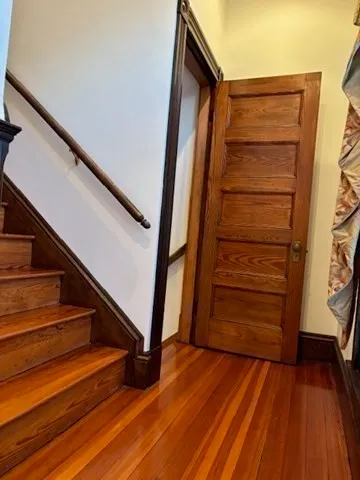 a view of walk in closet with stairs
