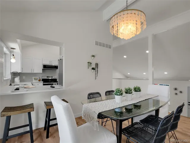 a view of a dining room with furniture