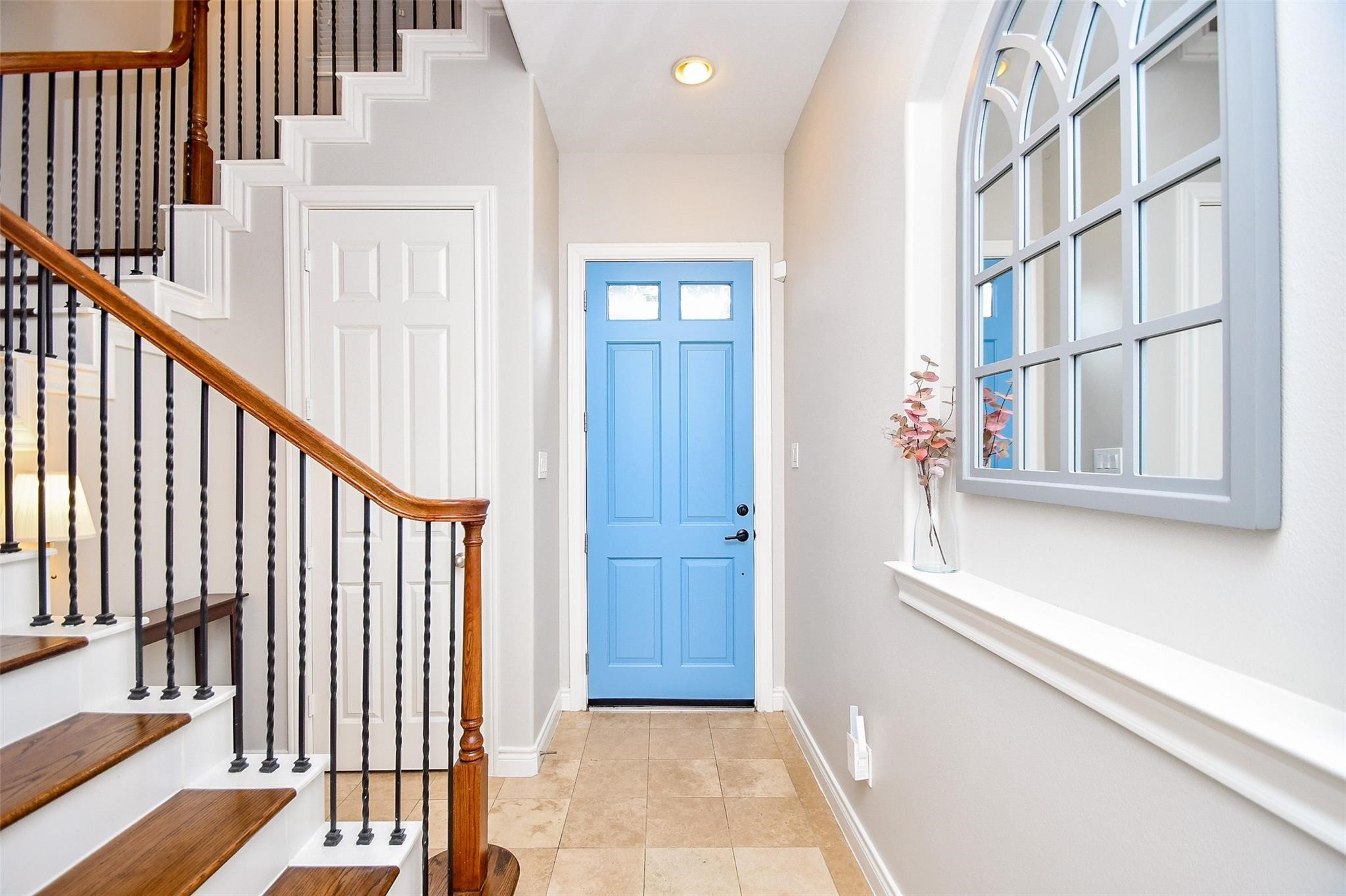 2614 Maxroy Street Houston, TX 77007 - Photo 6 of 32 a view of a hallway with wooden floor and staircase