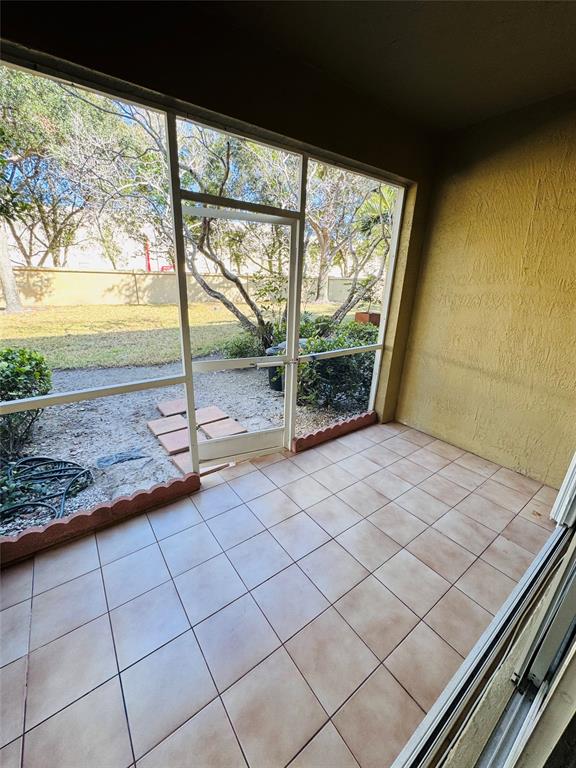 12113 Southwest 2nd Street Pembroke Pines, FL 33025 - Photo 16 of 18 a view of a room with wooden floor