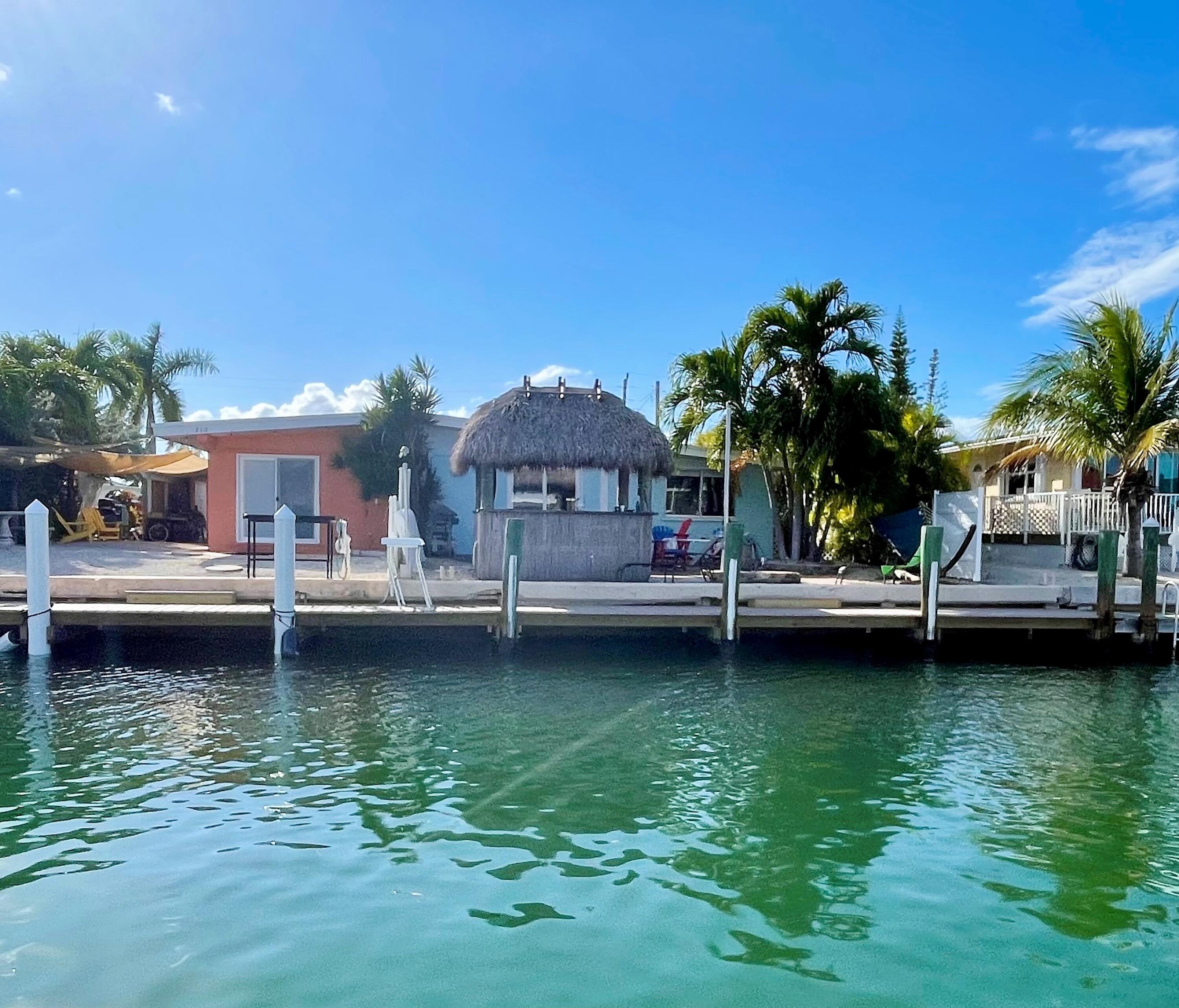 270 9th Street Key Colony Beach, FL 33051 - Photo 24 of 37 a view of a lake with houses