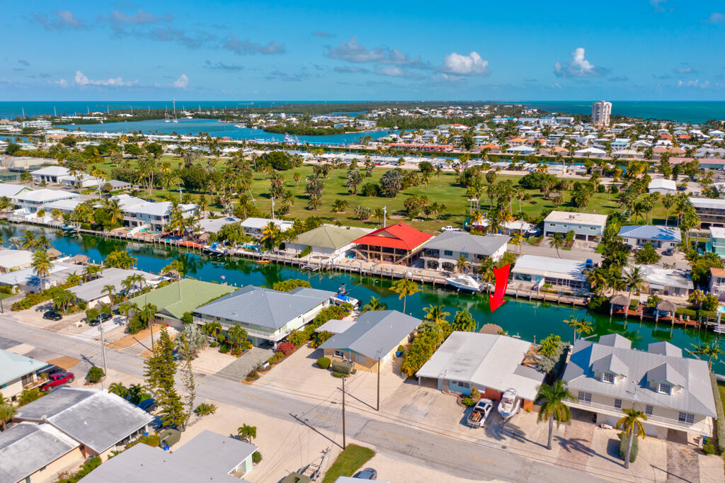 270 9th Street Key Colony Beach, FL 33051 - Photo 25 of 37 an aerial view of residential houses with outdoor space and lake view
