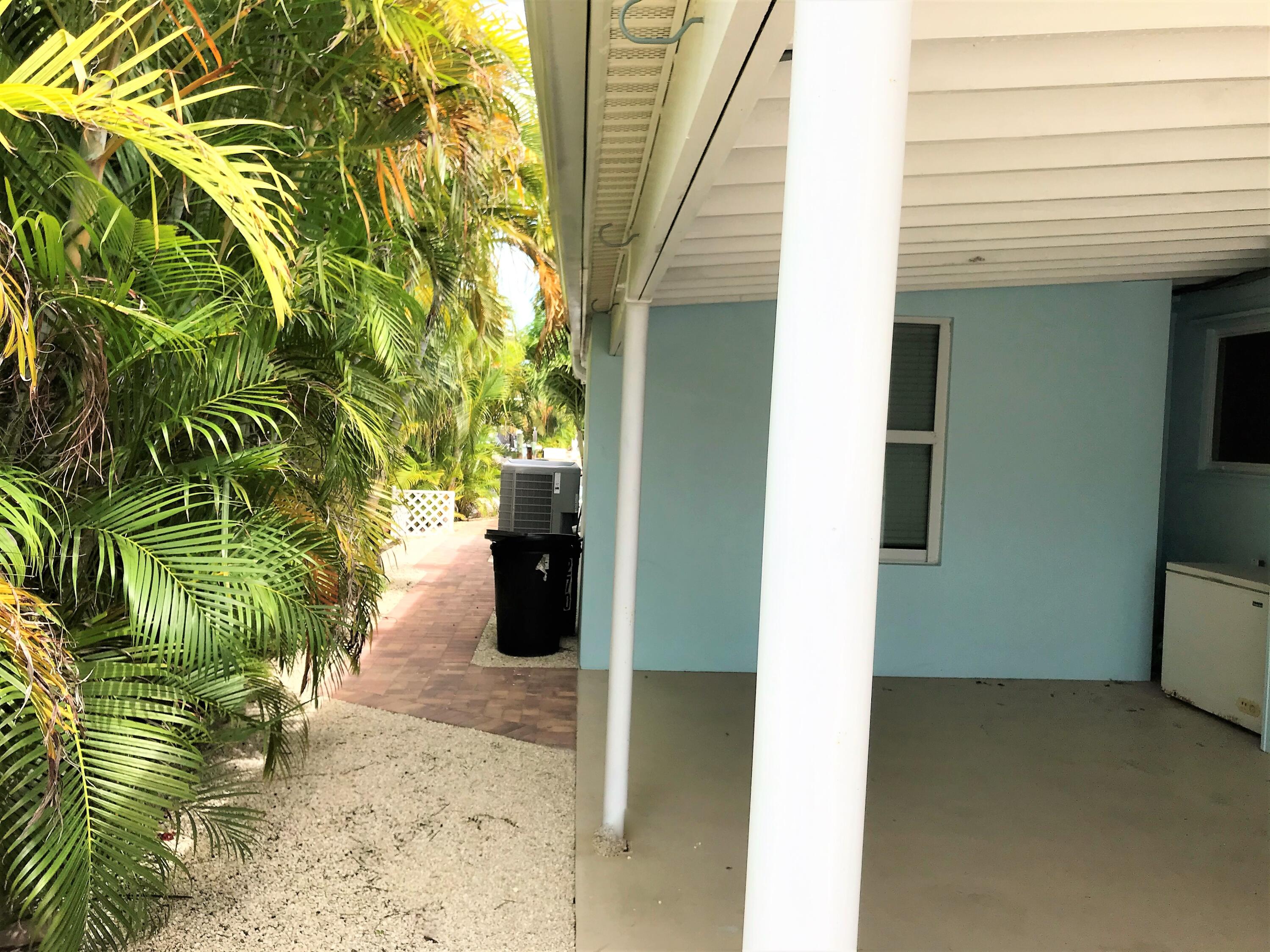 270 9th Street Key Colony Beach, FL 33051 - Photo 27 of 37 a view of a potted plants in front of a door