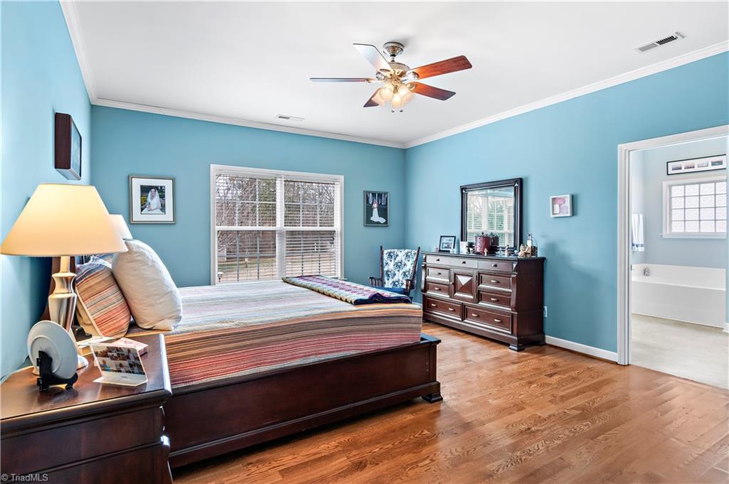 2151 Hickory Tree Road Winston-Salem, NC 27127 - Photo 15 of 31 Primary Bedroom w/ensuite has plenty of space for every piece of your furniture - currently has king size bed