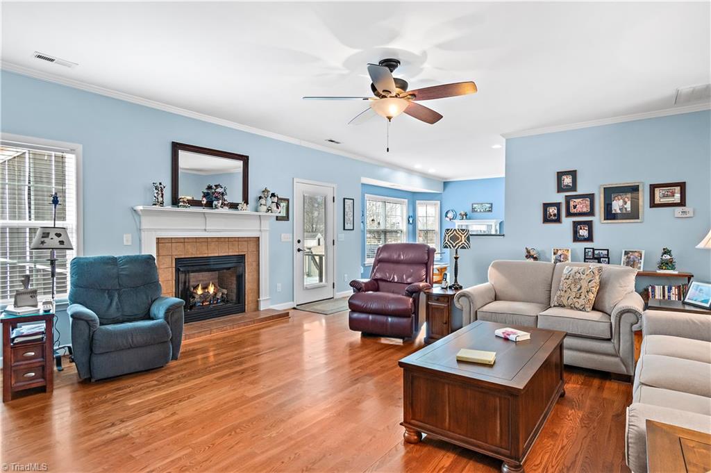 2151 Hickory Tree Road Winston-Salem, NC 27127 - Photo 5 of 31 Den has plenty of space for furniture and placement of TV. Go directly out to screened porch