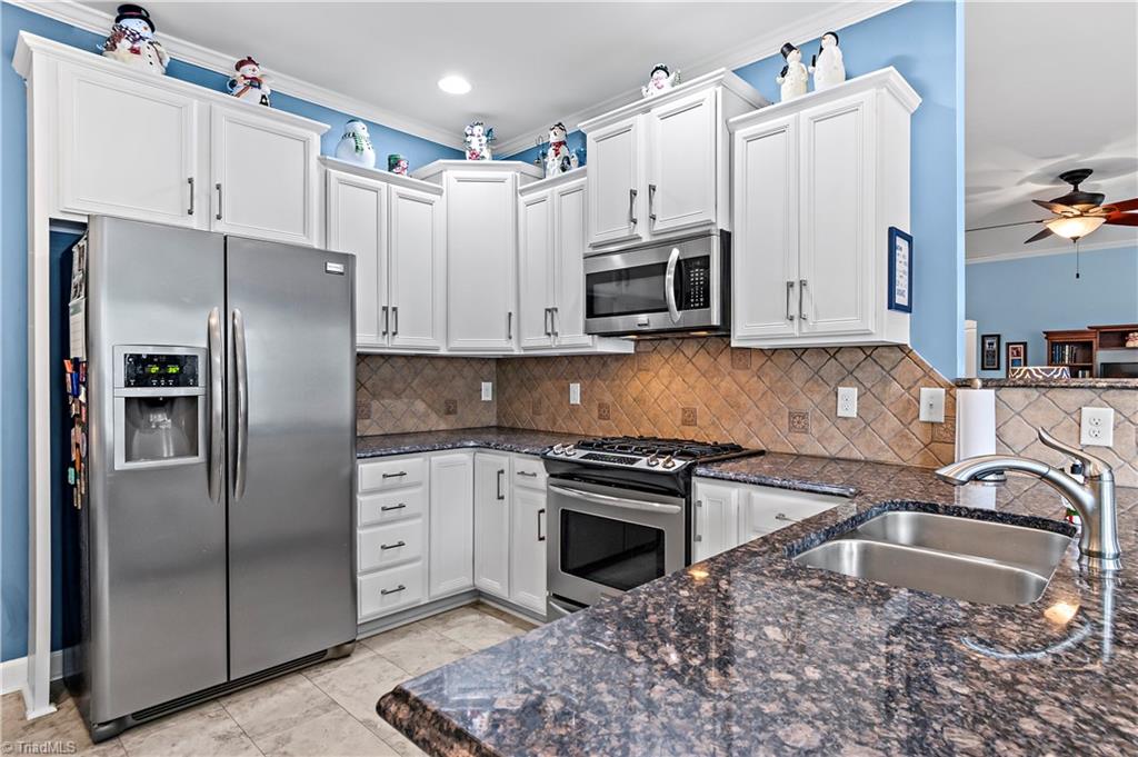 2151 Hickory Tree Road Winston-Salem, NC 27127 - Photo 10 of 31 Interact with your family and friends with the open design of the kitchen