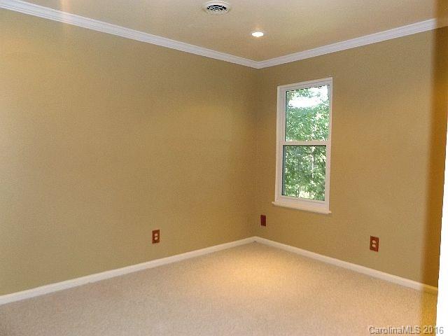 27076 Catamaran Drive Tega Cay, SC 29708 - Photo 11 of 22 an empty room with a window