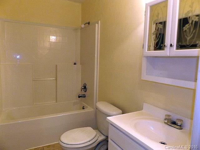 27076 Catamaran Drive Tega Cay, SC 29708 - Photo 12 of 22 a bathroom with a sink toilet and shower