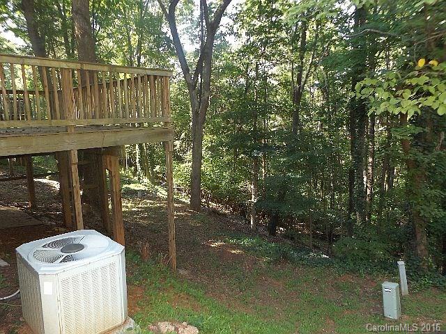 27076 Catamaran Drive Tega Cay, SC 29708 - Photo 19 of 22 a view of a house with backyard porch and sitting area
