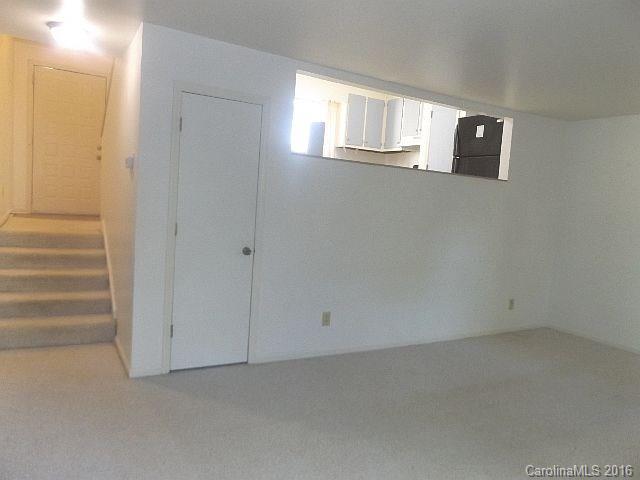 27076 Catamaran Drive Tega Cay, SC 29708 - Photo 5 of 22 a view of an empty room with a window