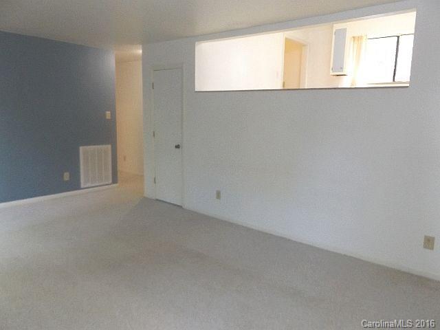 27076 Catamaran Drive Tega Cay, SC 29708 - Photo 6 of 22 an empty room with windows
