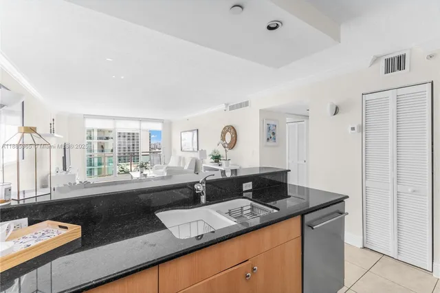 a view of counter top space and sink