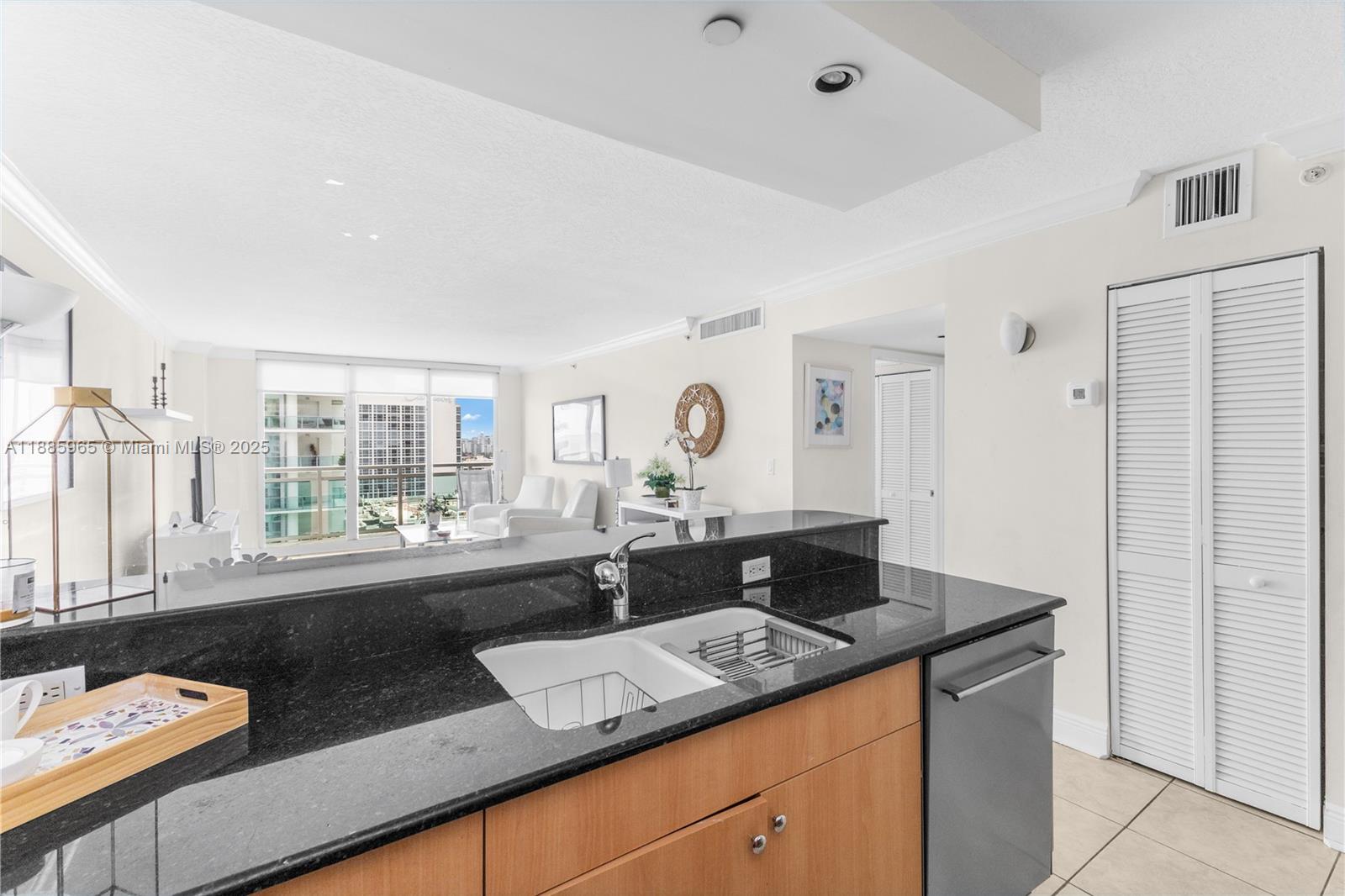 6917 Collins Avenue, Unit 1505 Miami Beach, FL 33141 - Photo 11 of 53 a view of counter top space and sink