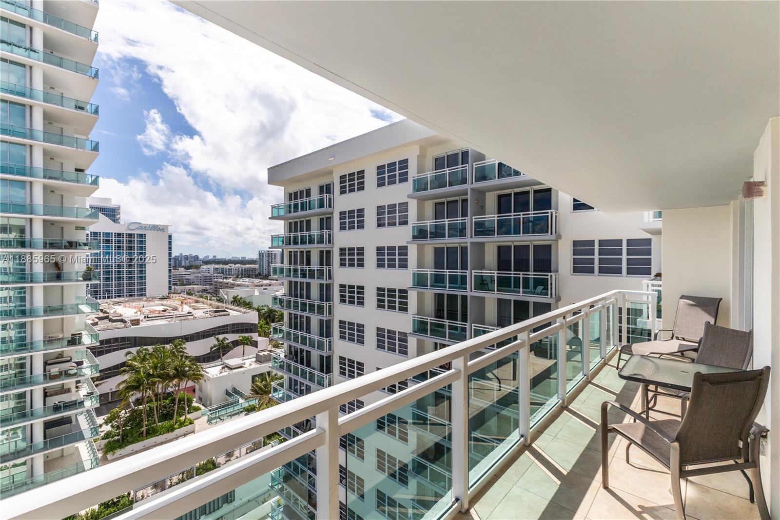 6917 Collins Avenue, Unit 1505 Miami Beach, FL 33141 - Photo 16 of 53 a view of balcony with wooden floor