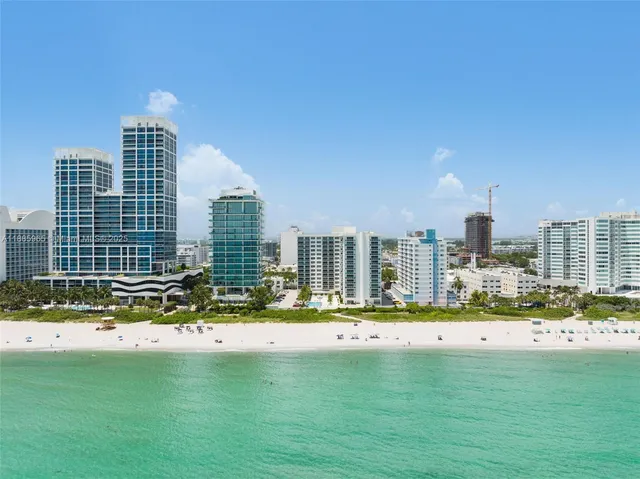 a view of a city with tall buildings