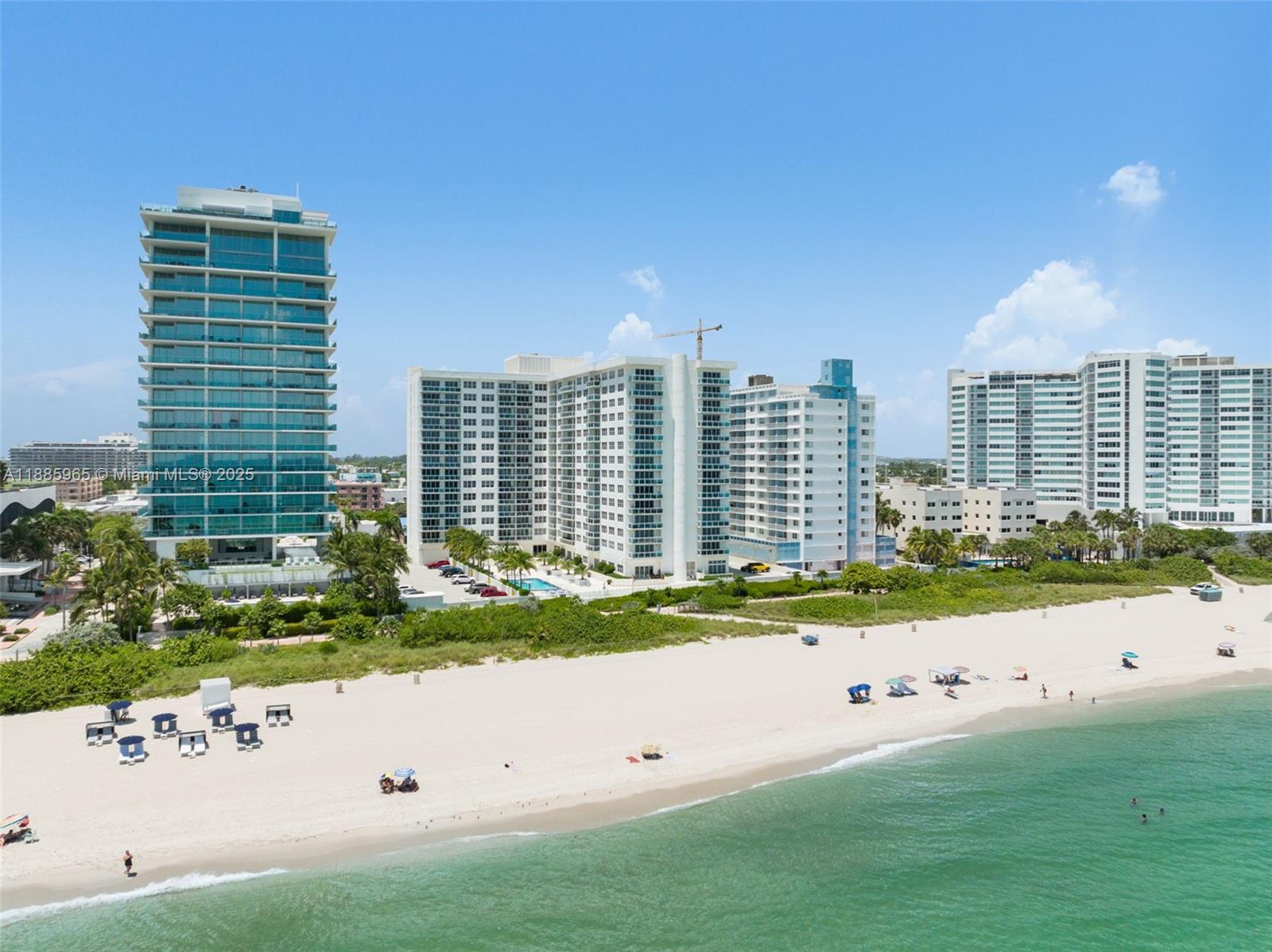 6917 Collins Avenue, Unit 1505 Miami Beach, FL 33141 - Photo 35 of 53 a view of building with yard
