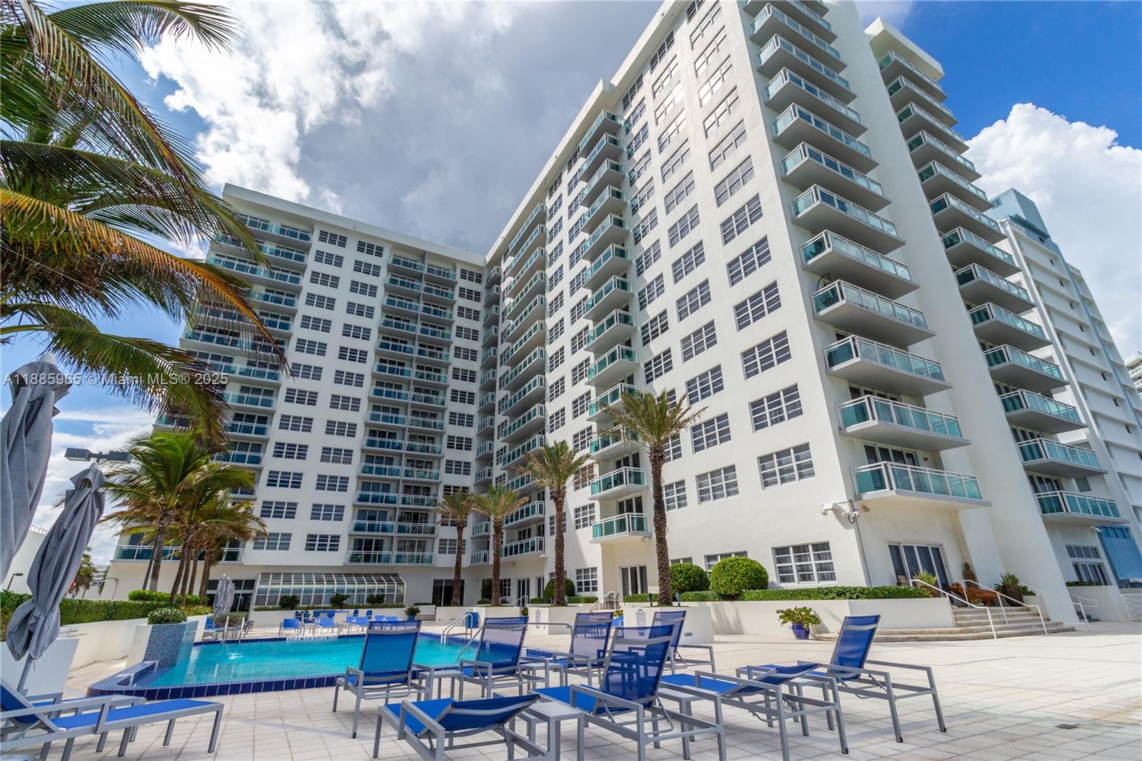 6917 Collins Avenue, Unit 1505 Miami Beach, FL 33141 - Photo 51 of 53 a building view with outdoor seating space