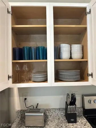 a closeup of a cabinet with wooden floor