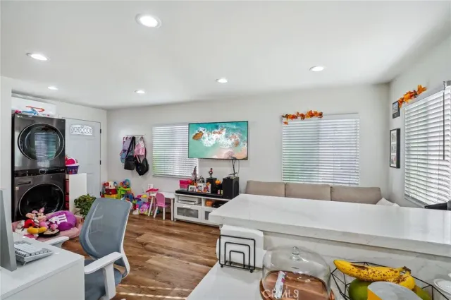 a bedroom with a bed and cabinets