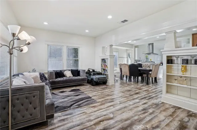 a dining room with furniture and window
