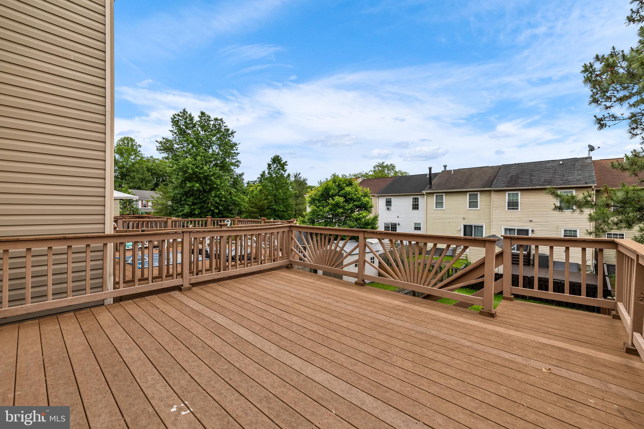 3790 Timahoe Circle Baltimore, MD 21236 - Photo 22 of 33 a view of balcony with wooden floor and fence