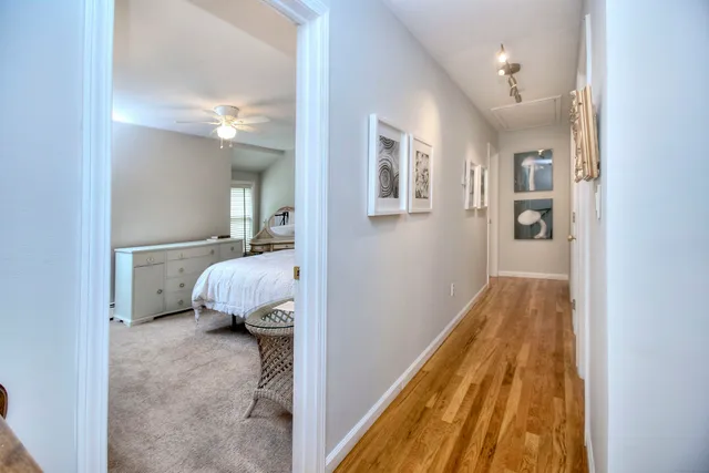 a kitchen with sink and refrigerator