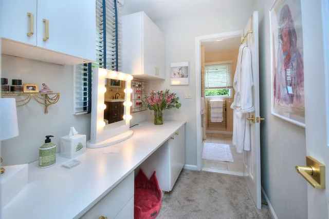 a bathroom with a toilet and shower