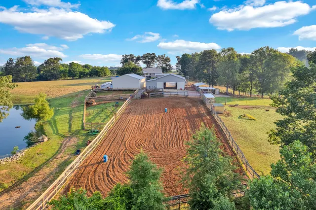 a view of swimming pool with a yard