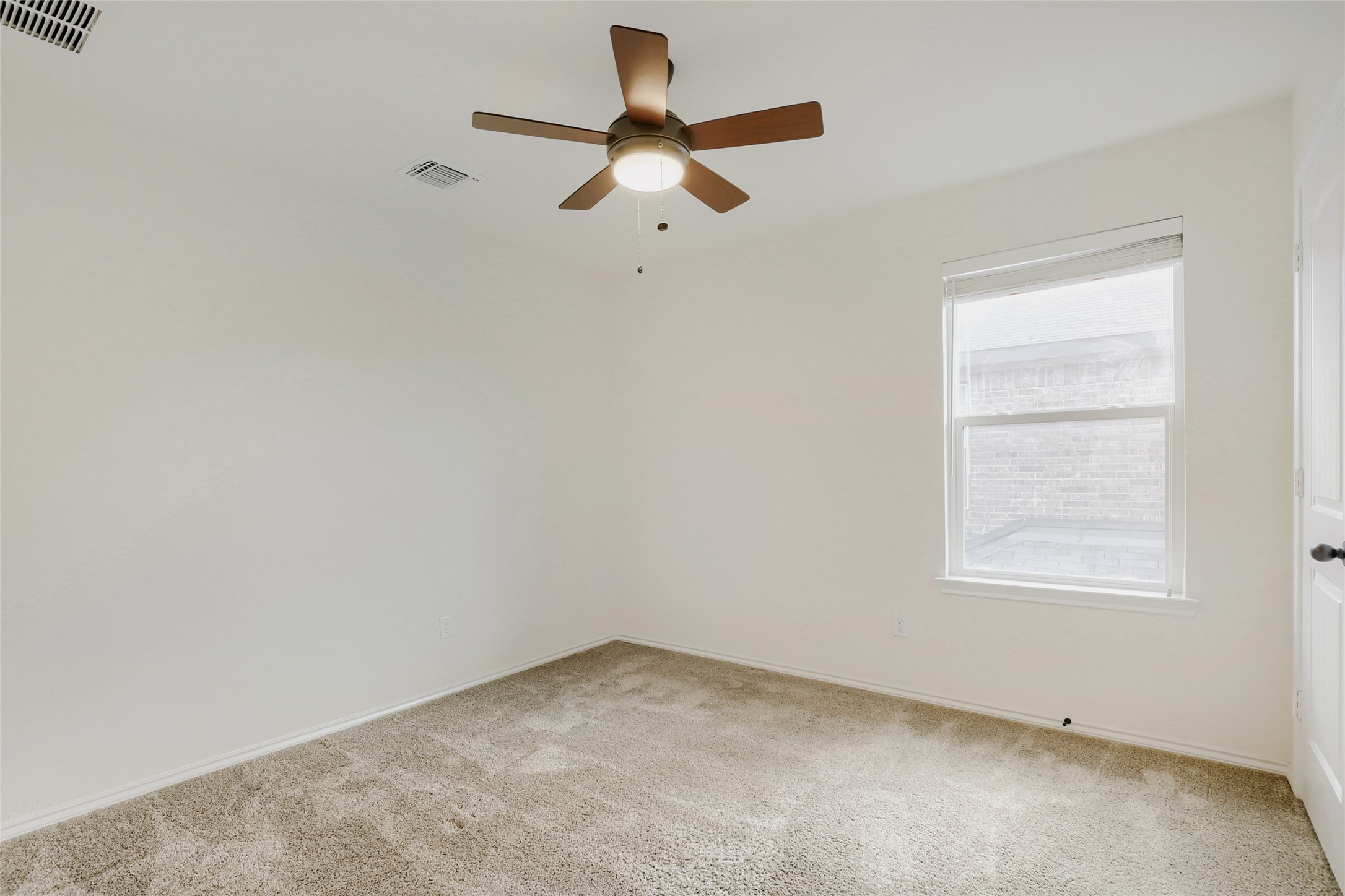 104 Kavanaugh Street Georgetown, TX 78628 - Photo 23 of 30 Bedroom 3 with ceiling fan and binds